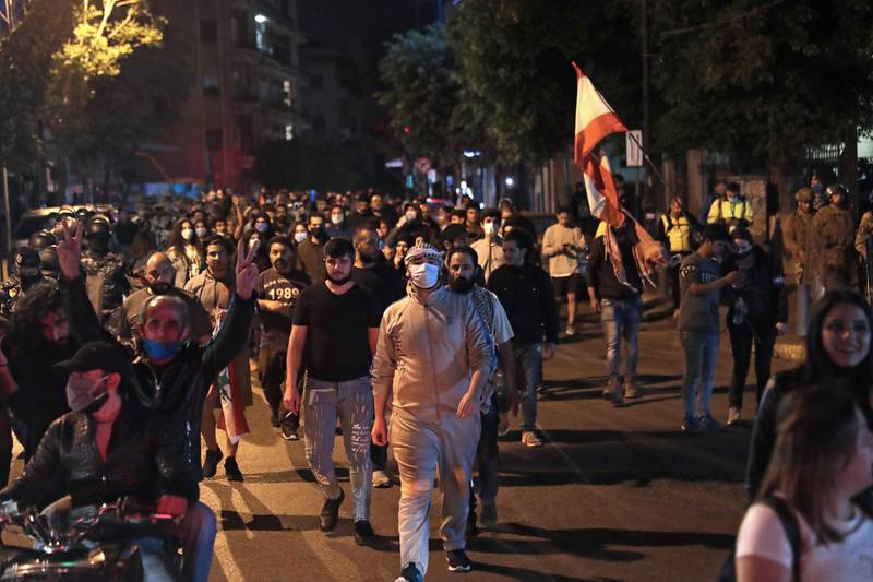 Lebanese demonstrators chant anti-government slogans while they walk through the streets of the capital Beirut. AFP