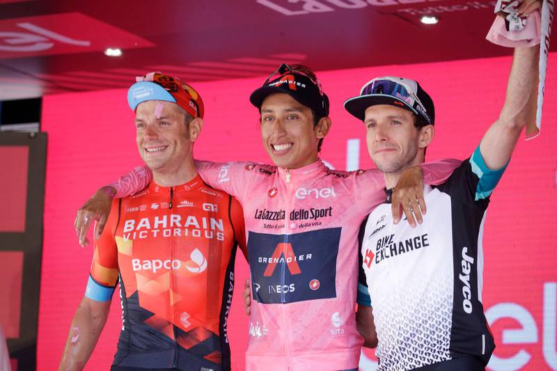 Egan Bernal is flanked by runner-up Damiano Caruso and Simon Yates, right, on the podium after the final stage to win the Giro d'Italia. AP
