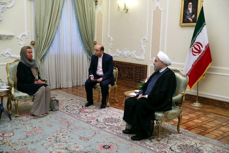 Iranian president Hassan Rouhani meets with European foreign policy chief Federica Mogherini before his swearing-in ceremony for a further term, at the parliament in Tehran, Iran. Reuters