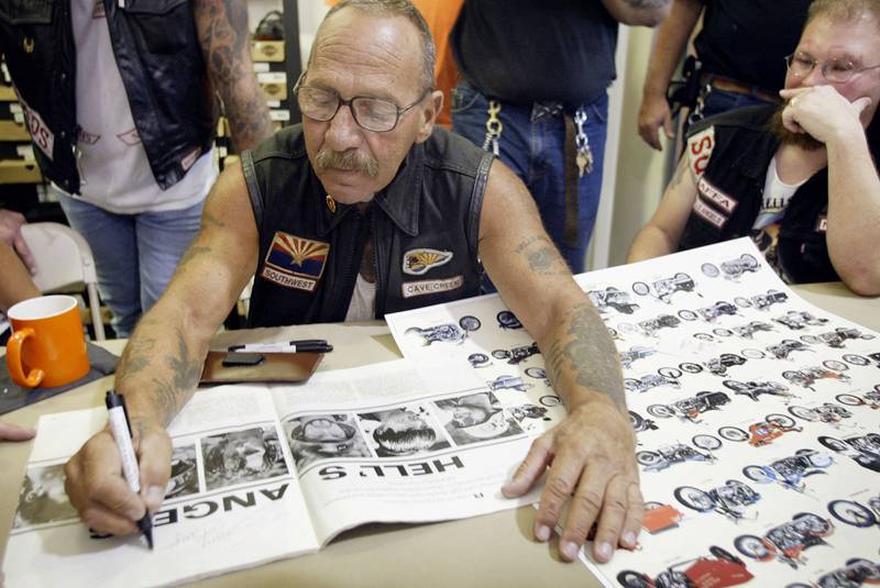 Barger signs autographs at a Harley-Davidson motorcycle dealership in Quincy, Illinois.  Getty /  AFP