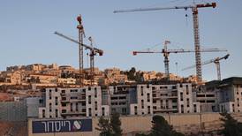Israel is defying UN resolution on halting settlements, envoy says