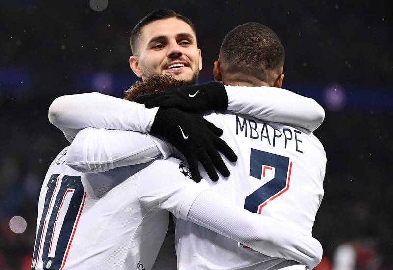 In this file photo taken on December 11, 2019 Paris Saint-Germain's Mauro Icardi, centre, Neymar, left and Kylian Mbappe celebrate a goal against Galatasaray. AFP