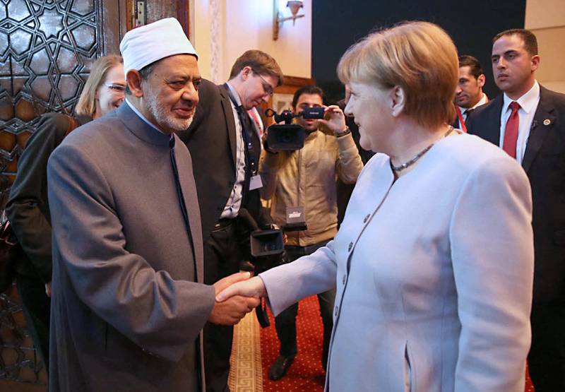 Dr Al Tayeb meets German Chancellor Angela Merkel in Cairo on March 2, 2017. AFP