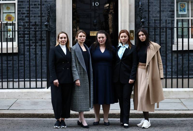 Ukrainian Members of Parliament pose with British MP Alicia Kearns outside Number 10 Downing Street. Reuters