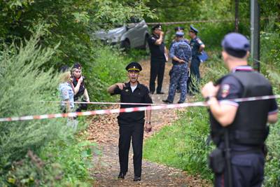 Police at the site where a Ukrainian drone targeting the Russian capital was downed by an air defence system, in western Moscow, in August. AFP