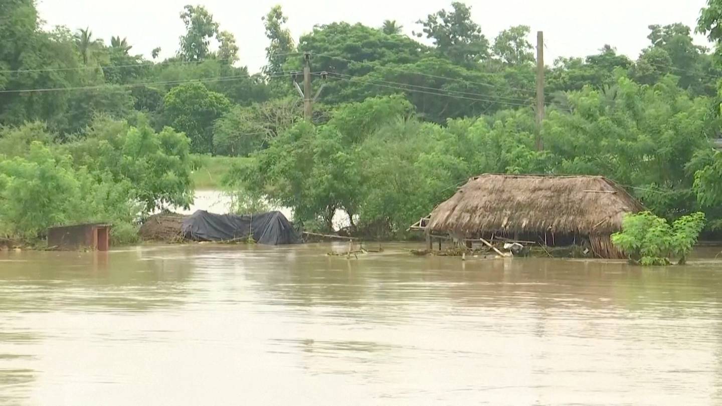 Huts are partially submerged in floodwater following heavy rains in Jagatsinghpur, Odisha, India, on August 20. Reuters