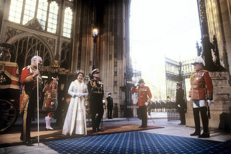 Queen Elizabeth II and the Duke of Edinburgh arrive at the Sovereign's Entrance to the Palace of Westminster during the State opening of Parliament.   (Photo by PA Images via Getty Images)
