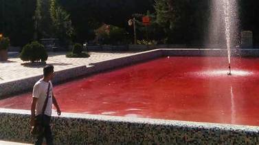 An image that illustrates this article Fountains in Tehran run blood-red in tribute to Mahsa Amini