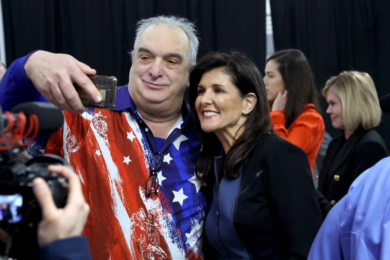 Republican presidential candidate and former UN ambassador Nikki Haley greets guests following an event in Clive, Iowa. Getty / AFP