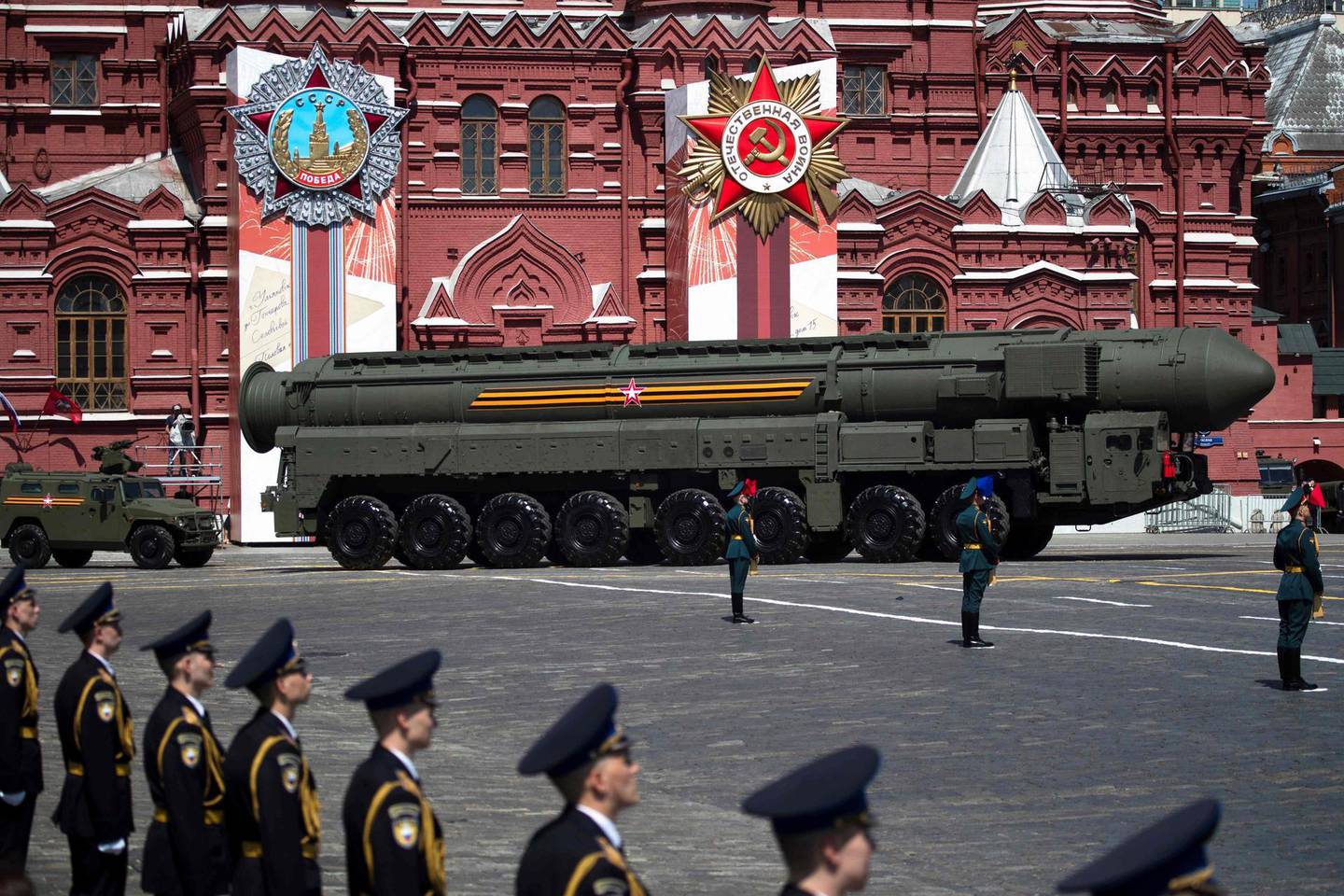 (FILES) In this file photo Russian army RS-24 Yars ballistic missile system moves through Red Square during a military parade, which marks the 75th anniversary of the Soviet victory over Nazi Germany in World War Two, in Moscow on June 24, 2020. US President Joe Biden's administration on February 3, 2021 extended the New START nuclear treaty with Russia by five years, saying it hoped to prevent an arms race despite rising tensions with Moscow including over its imprisonment of opposition leader Alexei Navalny. One day before the treaty was set to expire, Secretary of State Antony Blinken said the United States was extending New START by the maximum allowed time of five years.
 / AFP / POOL / Pavel Golovkin
