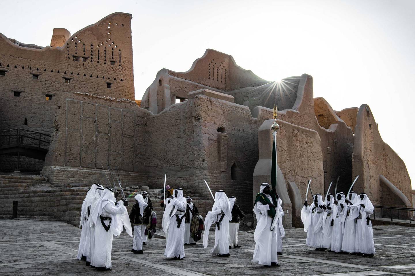 Traditional Saudi Ardah dance in front of Salwa Palace in At-Turaif in Ad Diriyah. Photo by THAMER AL AHMADI