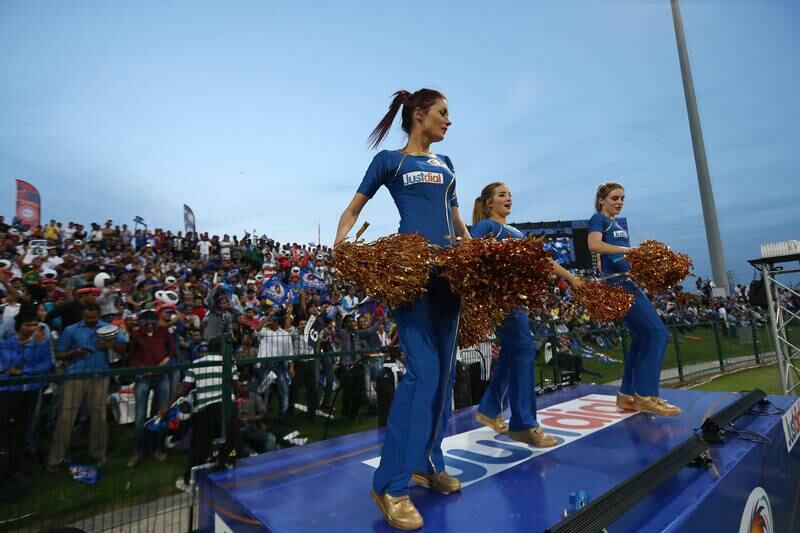 ABU DHABI , UNITED ARAB EMIRATES Ð April 16 , 2014 : Crowd and Cheerleaders during the IPL opening match between Mumbai Indians vs Kolkata Knight Riders at Zayed Cricket Stadium in Abu Dhabi. ( Pawan Singh / The National ) For Sports. Story by Osman