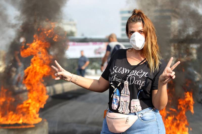 Lebanese demonstrators burn tyres in the industrial zone of Dora. AFP