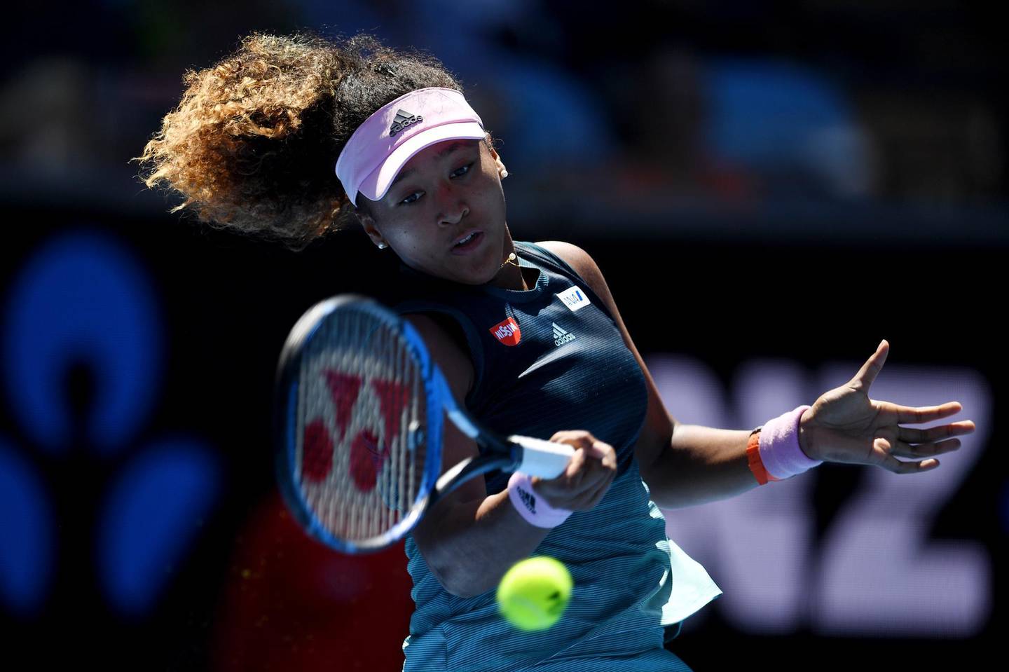 epa07298357 Naomi Osaka of Japan in action against Su-Wei Hsieh of Taiwan on day six of the Australian Open Grand Slam tennis tournament in Melbourne, Australia, 19 January 2019.  EPA/LUKAS COCH AUSTRALIA AND NEW ZEALAND OUT