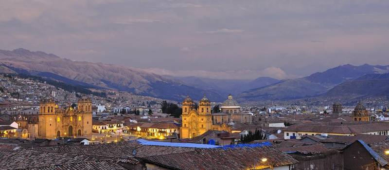An overview of the central Plaza de Armas in Cusco, which is made up of arcaded restaurants. Getty Images