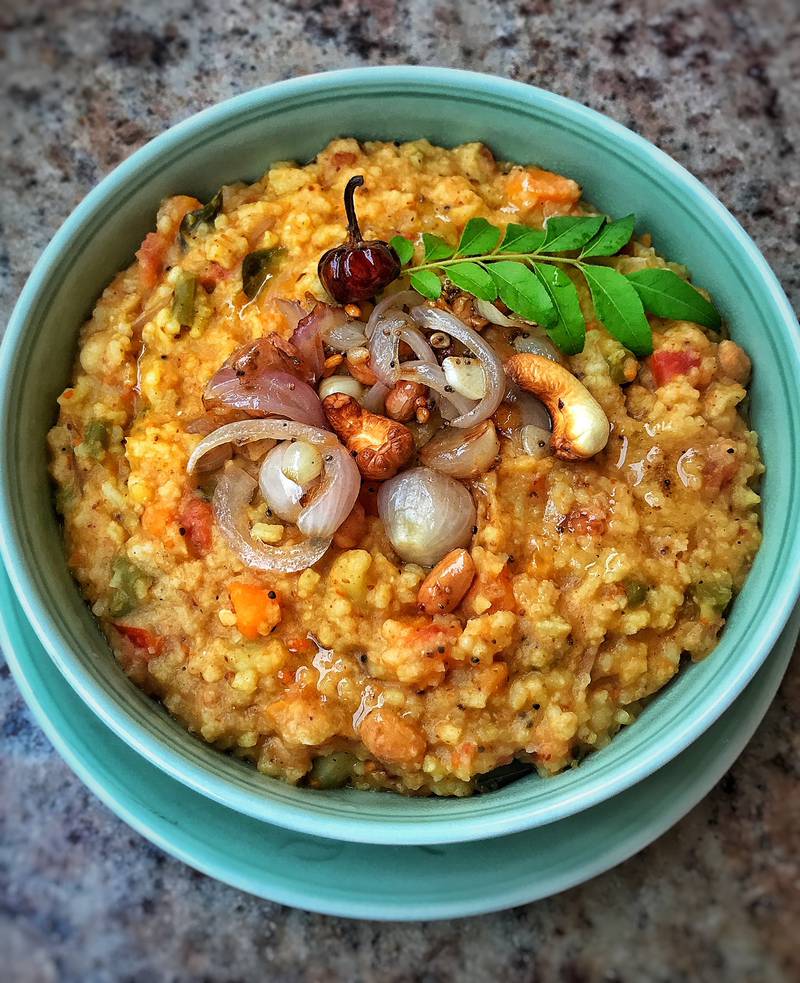 Khichdi has been adapted across India into simple and elaborate versions. Seen here is bisi bele bhat from Karnataka, a spicy lentil and rice combination with split pigeon beans, curry leaves, tamarind, asafetida and nutmeg.