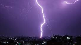Lightning and high waves in Lebanon and Israel - in pictures