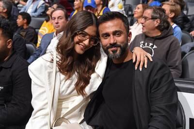 Sonam Kapoor and Anand Ahuja attend the game between the Golden State Warriors and the Los Angeles Lakers at Staples Centre in Los Angeles, California. AFP
