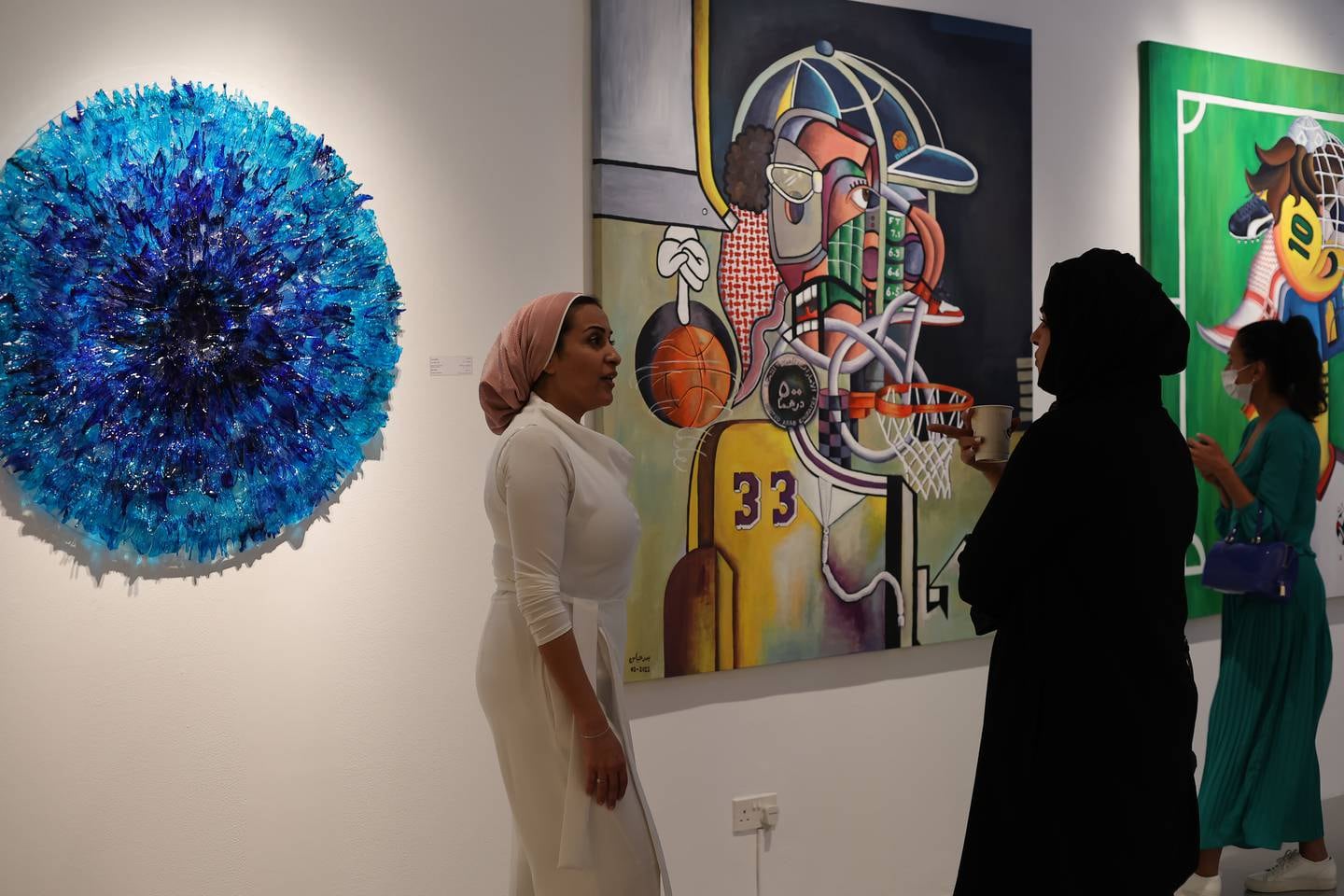 Emirati artist Badr Abbas mishmashes local pop culture references in his paintings. Photo: Tashkeel