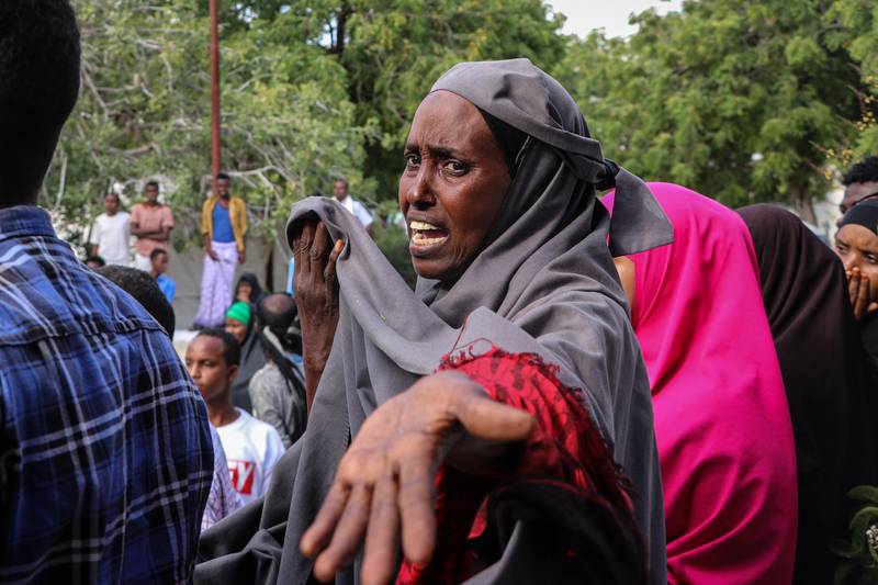 A Somali woman reacts as victims from a car bombing attack are brought to the Madina Hospital in Mogadishu. AFP