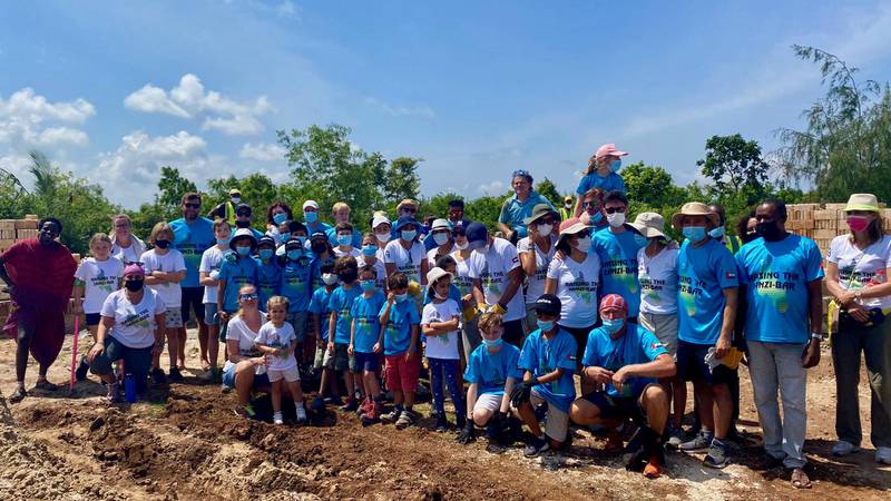 60 adults and children from the Fathers And Kids Camping group got together to help build the extra classrooms at the Seeds of Light school in Zanzibar. Courtesy, Fathers And Kids Camping
