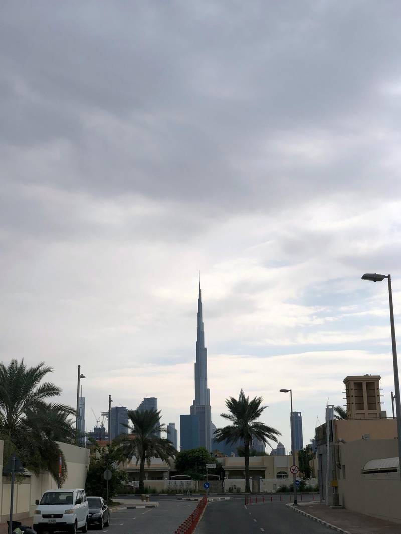 Dark clouds over the Burj Khalifa on Friday. Rory Reynolds / The National