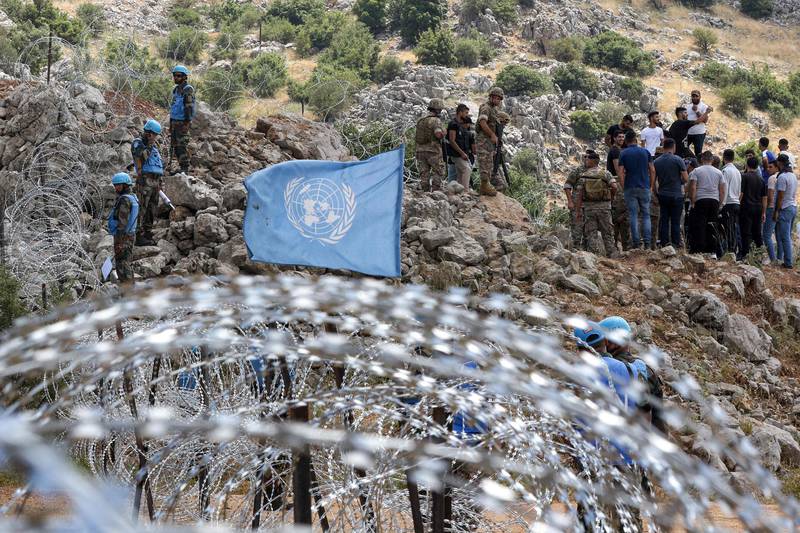 Peacekeepers of the United Nations Interim Force in Lebanon and Lebanese army soldiers stand on guard on the 'blue line'- drawn by the UN to mark Israel's withdrawal from southern Lebanon in 2000. AFP