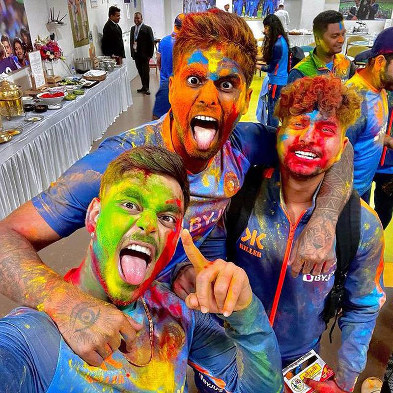Suryakumar Yadav, Ishan Kishan and Kuldeep Yadav celebrate Holi. Photo: @surya_14kumar / Instagram