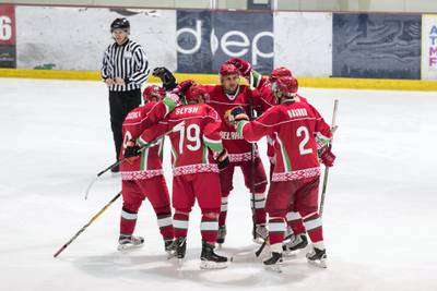 ABU DHABI, UNITED ARAB EMIRATES - NOV 17:Belarus President’s Team, red, celebrate their third goal against Abu Dhabi Storms, white, at the President’s Cup ice hockey tournament.(Photo by Reem Mohammed/The National)Reporter: AMITHSection: SP