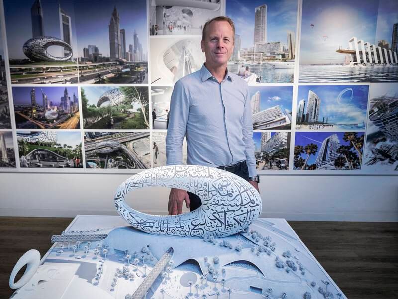 Shaun Killa, the architect who designed Dubai's Museum of the Future, with a model of the museum at his Killa Design offices in Dubai. Antonie Robertson / The National