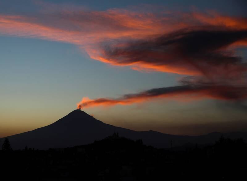 A general view shows a column of steam emerging from Popocatepetl volcano, after an increase in volcanic activity with steam and ash eruptions have been registered recently, according to local media, as seen from San Andres Cholula municipality, in the state of Puebla, Mexico February 1, 2023.  REUTERS / Henry Romero