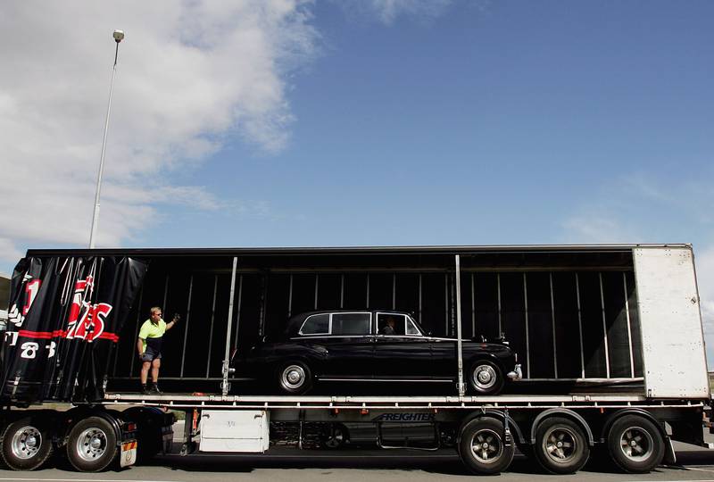 The Rolls Royce Phantom VI used to carry Queen Elizabeth II  is loaded on to a truck after her departure from Australia in 2006.