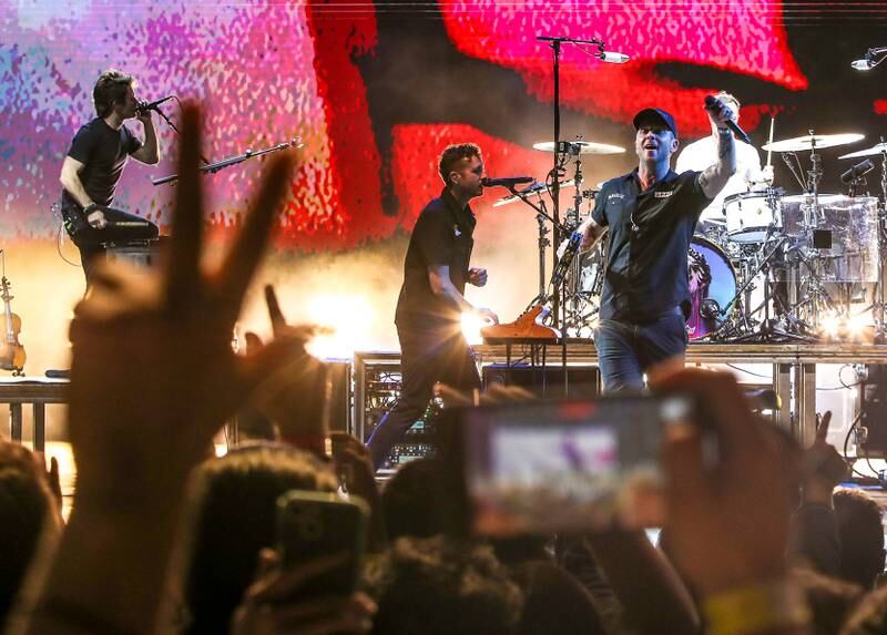 Ryan Tedder, right, led OneRepublic during the band's first Abu Dhabi appearance. Victor Besa / The National
