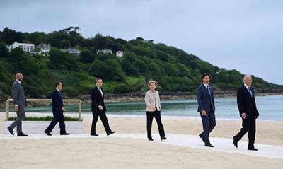 The G7 leaders arrive for the family photo. EPA