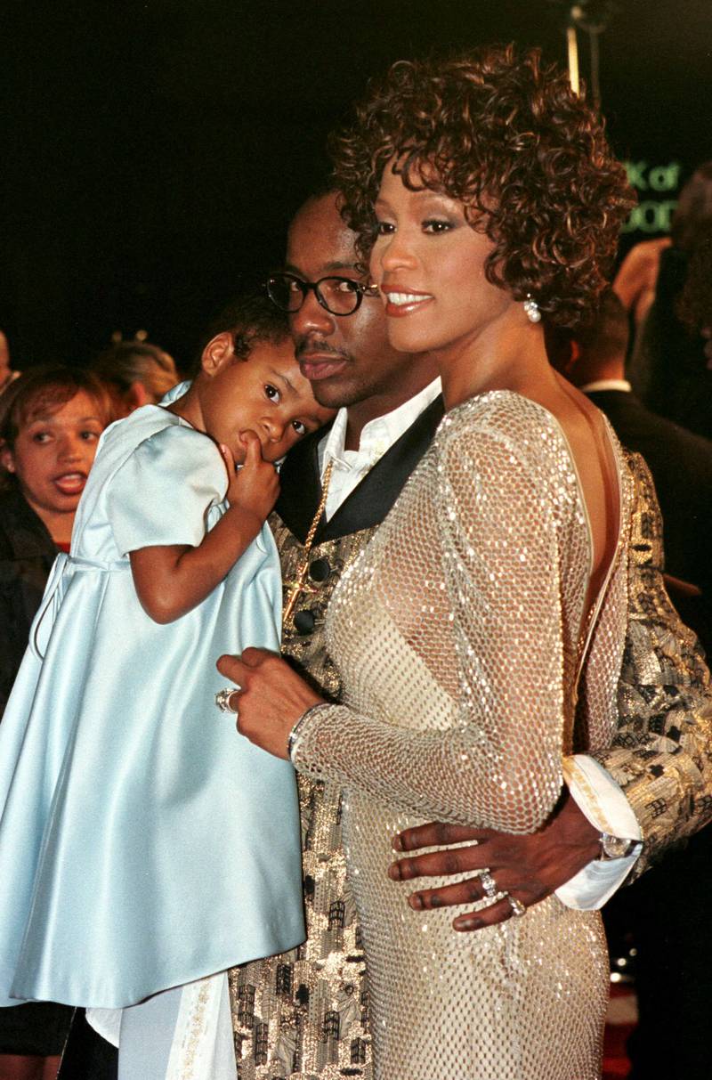 Houston with her husband Bobby Brown and their daughter Bobbi Kristina at the premiere of Houston's made-for-television movie, Cinderella, on October 13, 1997 at Mann's Chinese Theatre in Hollywood. Reuters