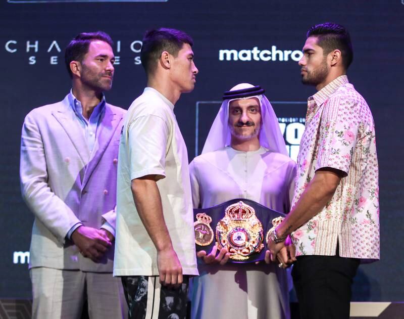 Edie Hearn, left, with Dmitry Bivol and Gilberto ‘Zurdo’ Ramirez, right, ahead of their WBA light-heavyweight title fight in Abu Dhabi. Victor Besa / The National