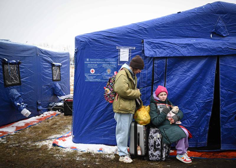 Refugees from Ukraine flock into Romania to escape Russia's invasion -- and avoid massive jams at the Polish border. AFP